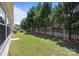 Well-maintained backyard featuring lush greenery and a privacy fence along the edge of the property at 5238 Prosperity View Dr, Charlotte, NC 28269