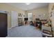 Neutral bedroom offers a comfortable space with carpeted floors and natural light at 5238 Prosperity View Dr, Charlotte, NC 28269