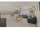 Cozy living room with a ceiling fan, carpet, sofas, and natural light from multiple windows at 5238 Prosperity View Dr, Charlotte, NC 28269