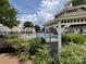 Community pool area with a gazebo and lush landscaping, ideal for summer relaxation at 5238 Prosperity View Dr, Charlotte, NC 28269