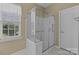 Updated bathroom with walk-in shower, grab bars and seat at 5238 Prosperity View Dr, Charlotte, NC 28269