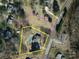 Aerial view of the property showcasing boundaries, surrounding neighborhood, and home's location at 5563 Grace Chapel Rd, Hickory, NC 28601