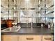Custom bar area with sink, cabinetry and storage for glassware and beverages at 5563 Grace Chapel Rd, Hickory, NC 28601