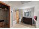Updated bathroom featuring a vanity, tiled floors, shower, and modern fixtures at 5563 Grace Chapel Rd, Hickory, NC 28601