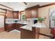 Bright eat-in kitchen features wood cabinets, granite countertops, and natural light at 5563 Grace Chapel Rd, Hickory, NC 28601