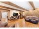 Large living room with hardwood floors, custom wood wall and access to dining room at 5563 Grace Chapel Rd, Hickory, NC 28601