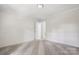 A simple bedroom with carpet and neutral decor at 613 Davis St, Lancaster, SC 29720