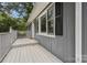 Inviting covered front porch and charming exterior details at 613 Davis St, Lancaster, SC 29720