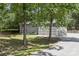 Home with a charming front porch and beautiful natural lighting at 613 Davis St, Lancaster, SC 29720