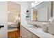 Stylish bathroom with a marble countertop vanity, decorative shelves, and modern fixtures at 6150 Rocky Falls Rd, Charlotte, NC 28211