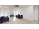 Cozy living room featuring a fireplace, neutral walls, and modern flooring at 6825 Woodleaf Rd, Woodleaf, NC 27054