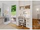 Bright office with built in storage, marble counters and access to a patio at 6934 Loretta Pl, Charlotte, NC 28215
