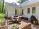 Inviting brick patio with outdoor seating, ideal for relaxing and entertaining guests at 6934 Loretta Pl, Charlotte, NC 28215