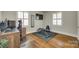 Versatile flex room with home gym setup and lots of natural light at 7026 Tabor Ln, Charlotte, NC 28211