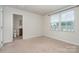 Bedroom featuring carpet flooring and an ensuite bathroom at 706 Dillon Way, Fort Mill, SC 29715