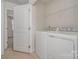 Laundry room featuring a washer, dryer and wire shelving for storage at 706 Dillon Way, Fort Mill, SC 29715