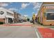 Street view of the downtown area featuring local businesses and crosswalk at 706 Dillon Way, Fort Mill, SC 29715