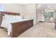 Spacious bedroom with a large bed and neutral decor, offering a relaxing atmosphere at 7344 Gilead Rd, Huntersville, NC 28078