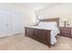 Comfortable bedroom with a large bed, side tables, and neutral-toned decor at 7344 Gilead Rd, Huntersville, NC 28078
