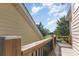 Exterior view from the deck, showcasing wooden rails, providing a tranquil outdoor retreat at 7344 Gilead Rd, Huntersville, NC 28078