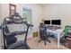 Office area featuring a treadmill, desk and a large window at 7344 Gilead Rd, Huntersville, NC 28078