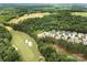 Serene aerial view of a neighborhood near a lush golf course and beautiful greenery in the background at 765 Cherry Hills Pl, Rock Hill, SC 29730