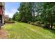 Beautifully maintained backyard featuring mature landscaping at 765 Cherry Hills Pl, Rock Hill, SC 29730