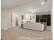 Basement den with built-ins, neutral walls and carpeted floor at 765 Cherry Hills Pl, Rock Hill, SC 29730