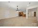 A basement offering a kitchenette, access to stairs and exterior, and space for multiple activities at 765 Cherry Hills Pl, Rock Hill, SC 29730