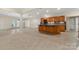Spacious finished basement with a wet bar, tile floors, and access to the backyard at 765 Cherry Hills Pl, Rock Hill, SC 29730