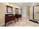 Bathroom showcasing dual vanities, a glass-enclosed shower, and tile flooring at 765 Cherry Hills Pl, Rock Hill, SC 29730