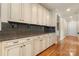 Well-designed kitchen features custom cabinetry, granite countertops, and hardwood floors at 765 Cherry Hills Pl, Rock Hill, SC 29730