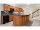 View of the kitchenette with ample cabinet space and countertop, connected to living area at 765 Cherry Hills Pl, Rock Hill, SC 29730