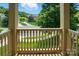 Balcony view of neighborhood street and landscaping at 7903 Tottenham Ct, Waxhaw, NC 28173