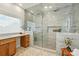 Bathroom with a large walk-in shower, patterned tile, and vanity at 7903 Tottenham Ct, Waxhaw, NC 28173