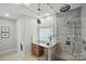 Modern bathroom featuring a walk-in shower with dual shower heads and decorative tile floors at 7903 Tottenham Ct, Waxhaw, NC 28173