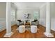 Cozy sitting room featuring neutral tones, comfortable seating, and natural light at 7903 Tottenham Ct, Waxhaw, NC 28173