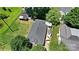 Aerial view of a well-maintained property showcasing the roof, backyard, and surrounding landscape at 805 Caldwell St, Belmont, NC 28012