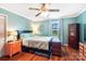 Cozy bedroom with wood flooring, natural light, and ample storage at 805 Caldwell St, Belmont, NC 28012