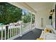Inviting porch with white railings, a 