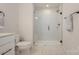 Bathroom featuring a modern glass shower, modern toilet and tiled flooring at 808 Dogwood Creek Ln, Indian Trail, NC 28079