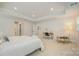 Bright bedroom featuring an office space, lots of windows, and carpet flooring at 808 Dogwood Creek Ln, Indian Trail, NC 28079