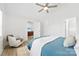 A view of the bedroom, with a partial view of bed, chair, and hallway to another room at 8438 Henry Harris Rd, Fort Mill, SC 29707