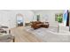Stylish living room featuring hardwood floors, comfortable seating, and modern decor at 8438 Henry Harris Rd, Fort Mill, SC 29707