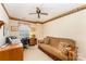 Bedroom with a futon, desk, and window overlooking the backyard at 8701 Appaloosa Way Ln, Charlotte, NC 28216