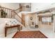 Welcoming foyer featuring a staircase, traditional decor, and ample natural light at 8701 Appaloosa Way Ln, Charlotte, NC 28216