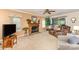 Cozy living room with a fireplace, sliding glass doors, and comfortable seating at 8701 Appaloosa Way Ln, Charlotte, NC 28216