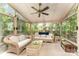 Bright sunroom with wicker furniture and multiple windows offering natural light at 8701 Appaloosa Way Ln, Charlotte, NC 28216