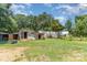 Backyard view of lawn with shed and partial fence at 107 Skyuka Rd, Statesville, NC 28677