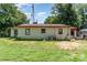 Exterior view of the side and back of the home with lawn at 107 Skyuka Rd, Statesville, NC 28677